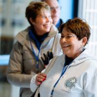 woman smiles during campus tour